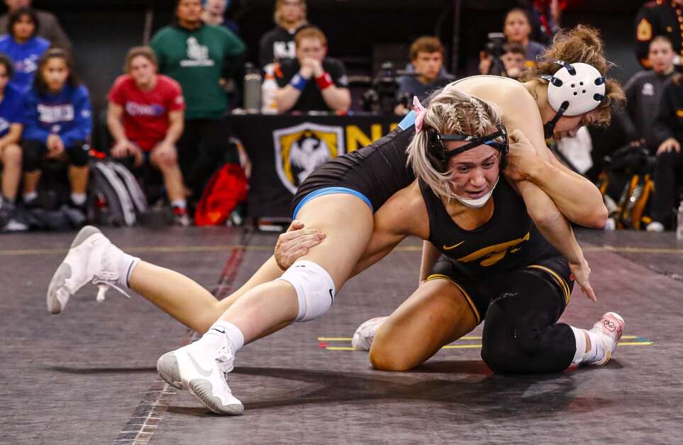 Iowa's Felicity Taylor competes against King University's Montana Delawder during the NWCA/USMC Multi-Division National Dual Meet Championships on Jan. 6 at the UNI-Dome in Cedar Falls. (Chris Zoeller/Waterloo Cedar Falls Courier)