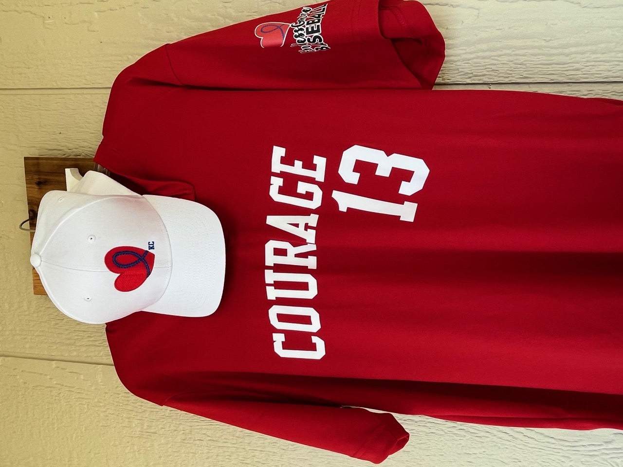 The Team Courage uniform. The other team, Team Strength, will wear blue.