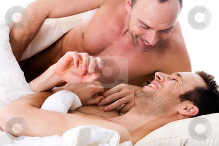 cutcaster-photo-100228078-Smiling-men-couple-in-bed.jpg