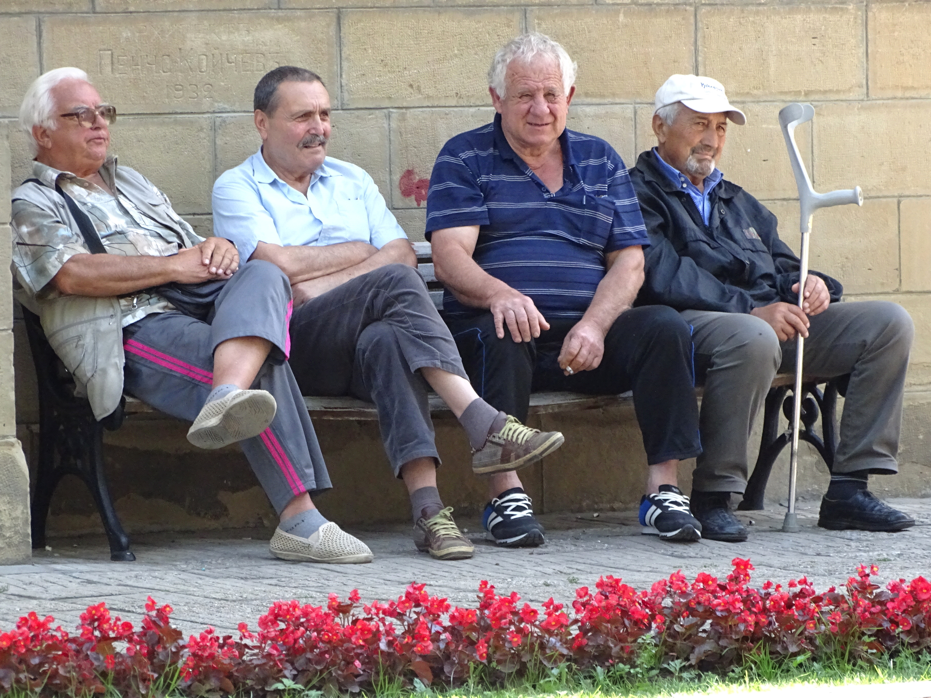 Elderly_Men_in_Plaza_-_Tryavna_-_Bulgaria_%2843237971431%29.jpg