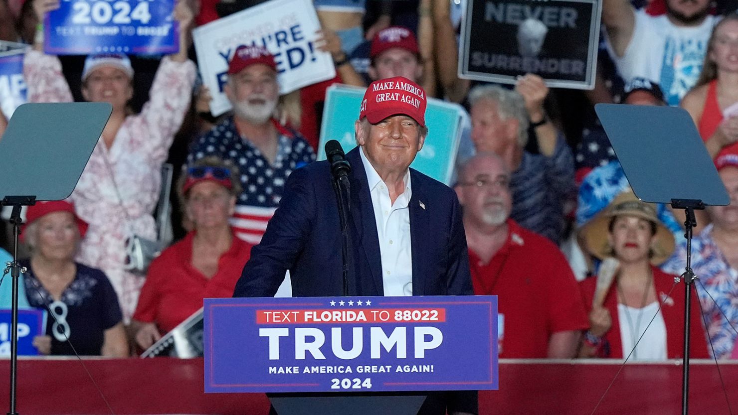Former President Donald Trump smiles during a campaign rally at Trump National Doral Miami on July 9, 2024, in Florida.