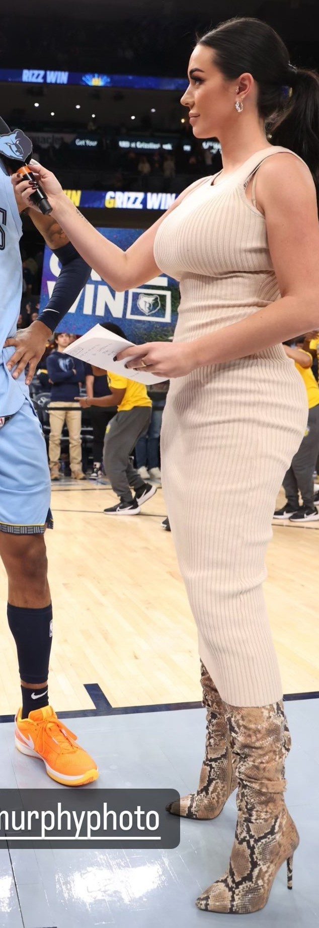 kj-wright-memphis-grizzlies-sideline-reporter-v0-8j0nis410eac1.jpg