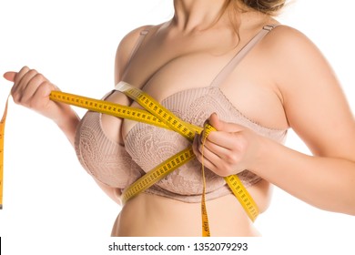 woman-measure-her-huge-breasts-260nw-1352079293.jpg