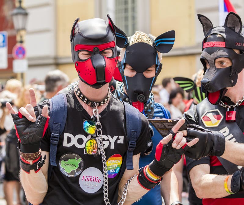 men-wearing-leather-dog-heads-attending-gay-pride-parade-also-known-as-christopher-street-day-csd-munich-germany-men-151740006.jpg