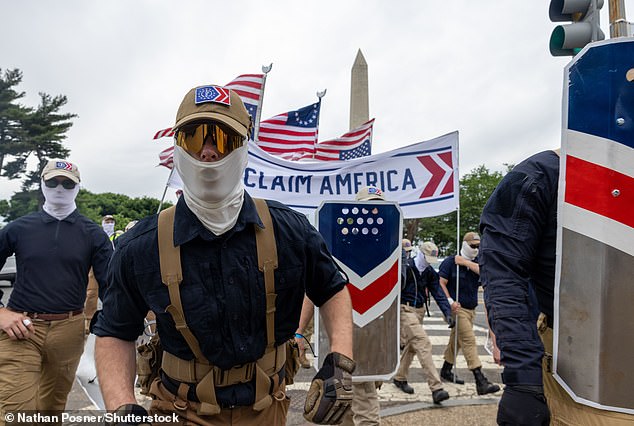 70956169-12080939-Around_200_members_of_white_supremacy_group_Patriot_Front_descen-a-50_1684033816175.jpg