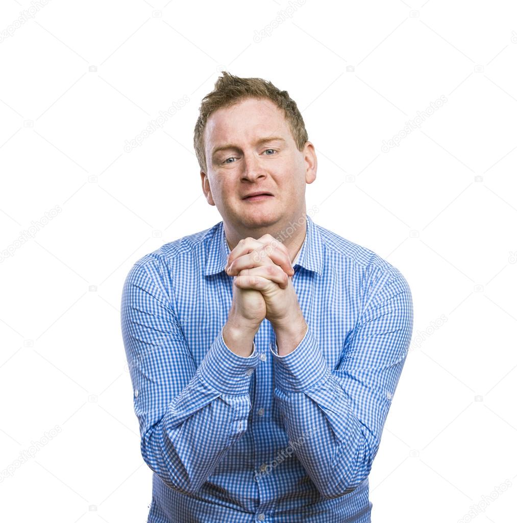 depositphotos_63905237-stock-photo-man-praying-with-clenched-hands.jpg