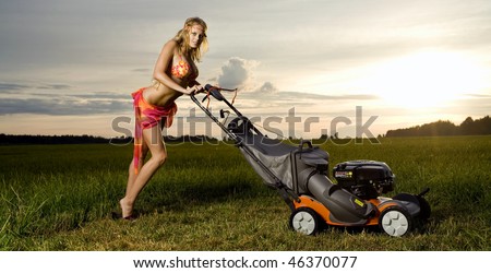 stock-photo-young-attractive-woman-is-mowing-the-grass-46370077.jpg
