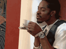 sipping-tea-andre3000.gif