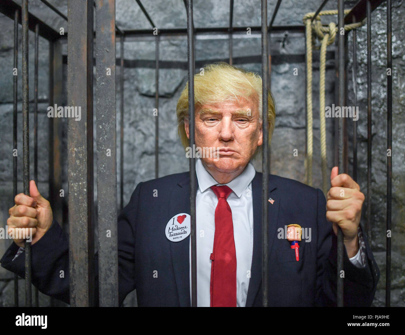 berlin-germany-05th-sep-2018-an-actor-of-the-wax-figure-cabinet-madame-tussauds-with-a-silicone-mask-of-us-president-donald-trump-stands-behind-the-bars-of-a-cage-in-a-torture-cellar-during-a-press-conference-in-the-berlin-dungeon-the-live-figure-can-currently-be-seen-with-live-performances-at-madame-tussauds-in-the-dungeons-the-dark-past-of-the-city-of-berlin-is-brought-up-for-discussion-credit-jens-kalaenedpa-zentralbildzbdpaalamy-live-news-PJA9HE.jpg
