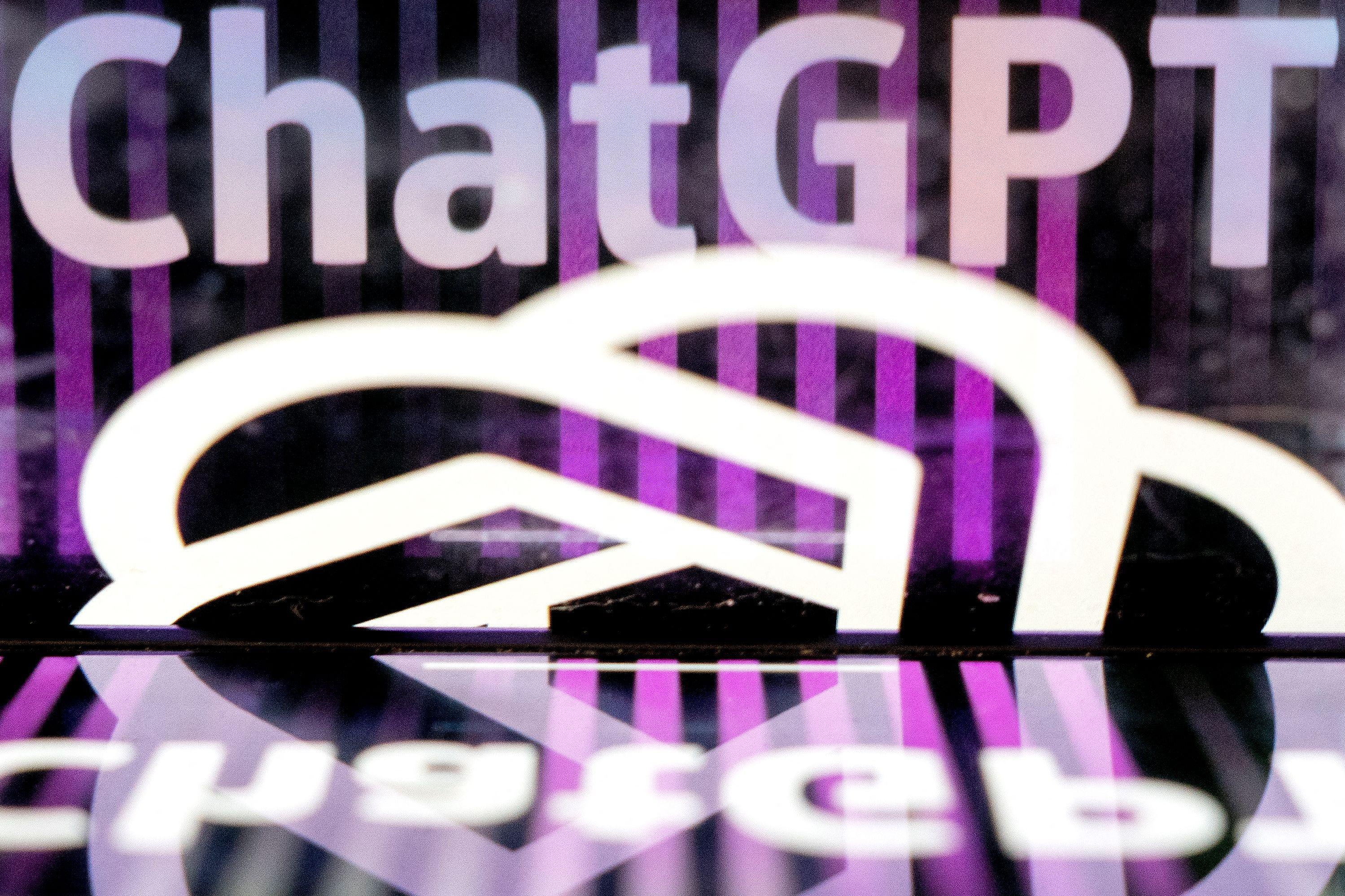 This photo illustration shows the ChatGPT logo at an office in Washington, DC, on March 15, 2023. - The company behind the ChatGPT app that churns out essays, poems or computing code on command released on March 14, 2023, a long-awaited update of its artificial intelligence (AI) technology that it said would be safer and more accurate than its predecessor. (Photo by Stefani Reynolds / AFP) (Photo by STEFANI REYNOLDS/AFP via Getty Images)