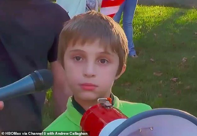 A young boy named, Jaden (pictured), whose last name was not released, claimed that 'Biden's a child molester and he kidnaps children and does horrible things to them just like Hillary Clinton and Obama who made the virus' in a documentary trailer for This Place Rules