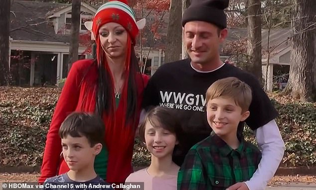The family-of-five (pictured) follow QAnon and Brandon (black t-shirt) introduced a Q-board to his son Jaden, where the boy claims he gets his information, such as the Vatican is made up of a 'reptilian bloodlines'