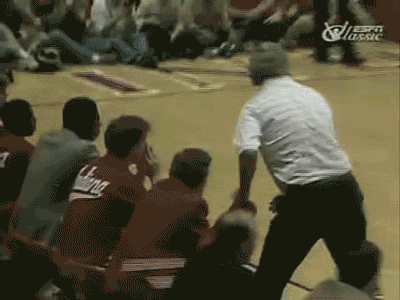Indiana-University-Head-Coach-Bob-Knight-Throws-Chair-On-Court.gif