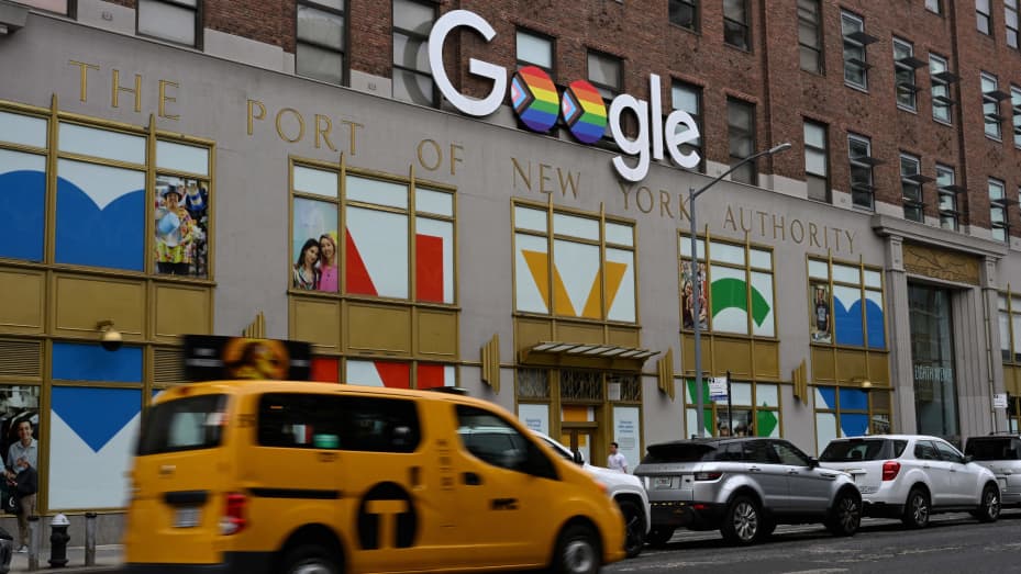 The Google logo is seen with the rainbow flag as a symbol of LGBTQ+ pride and social movements in New York City, June 7, 2022.