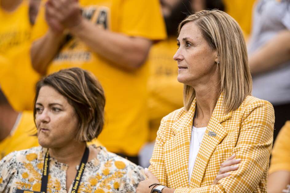 Iowa interim athletic director Beth Goetz (right) looks on during a game between the Iowa Hawkeyes and the Western Michigan Broncos at Kinnick Stadium in Iowa City, Iowa on Saturday, September 16, 2023. The Hawkeyes defeated the Broncos 41-10. (Nick Rohlman/The Gazette)