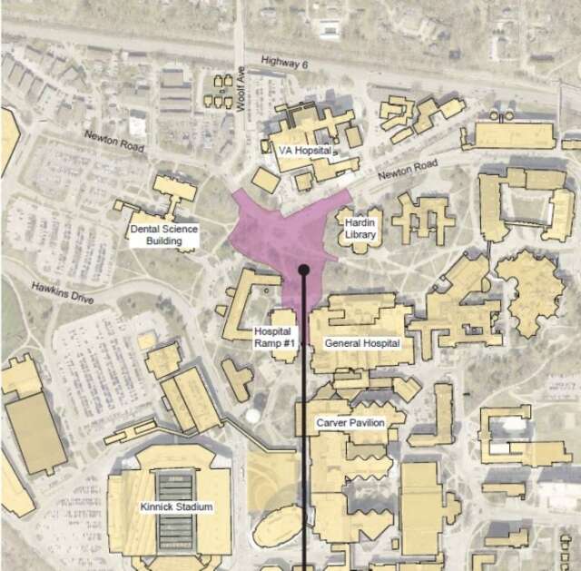 A proposed 1,500 linear feet of new roadway at the University of Iowa, which will involve a roundabout, will fall between Hospital Parking Ramp 1 and the general hospital pavilion, meaning that a popular bus stop serving 500 stops a day will be relocated temporarily. (Supplied photo)