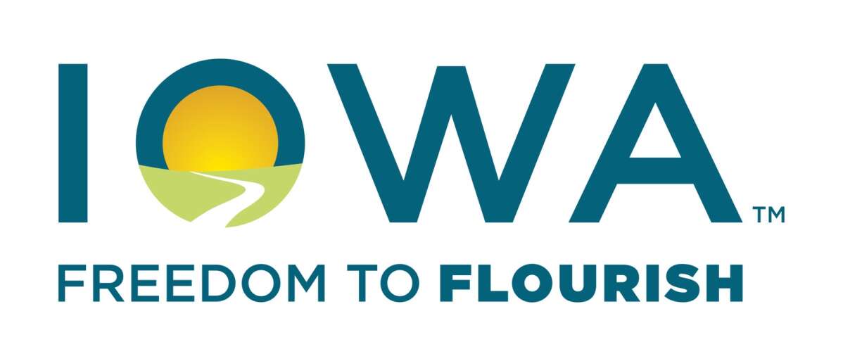 Iowa Gov. Kim Reynolds unveiled a new state slogan and logo during a news conference Tuesday, July 18, 2023 at the capitol in Des Moines. The slogan, Freedom to Flourish, will appear on state websites and highway welcome signs. (State of Iowa)
