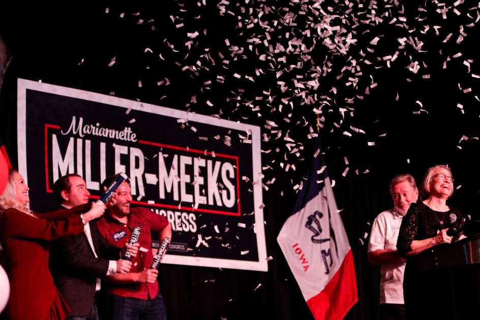 U.S. Rep. Mariannette Miller-Meeks, R-Ottumwa, celebrates with her family on stage Nov. 8, 2022, at the Rhythm City Casino in Davenport after being reelected to represent Iowa in the 1st Congressional District. (Nikos Frazier/Quad-City Times)