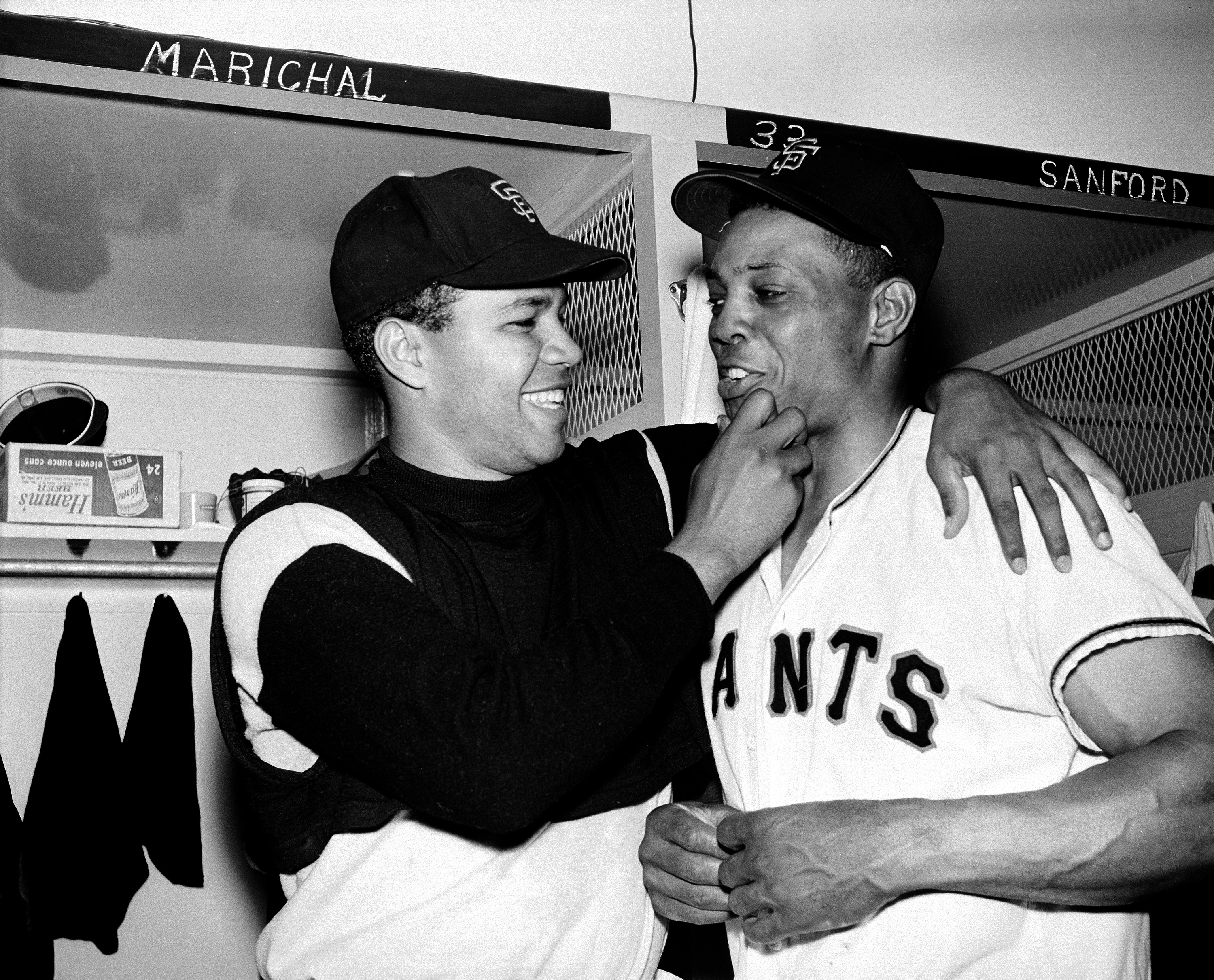 Juan Marichal and Willie Mays after the Giants' 1-0, 16-inning victory on July 2, 1963.