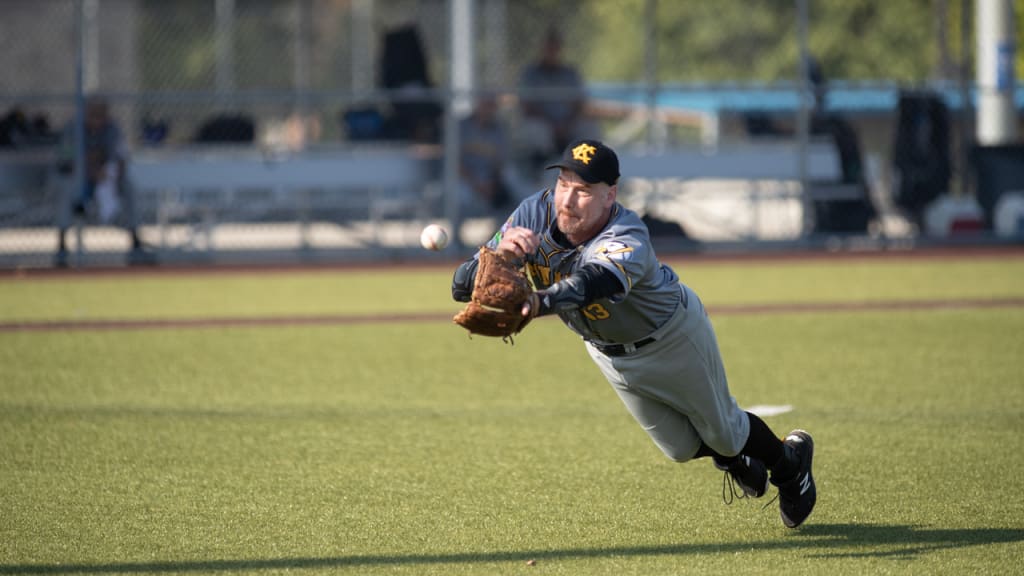 Scott Reinardy lays out for a diving catch in a local league game. Photo courtesy Scott Reinardy.
