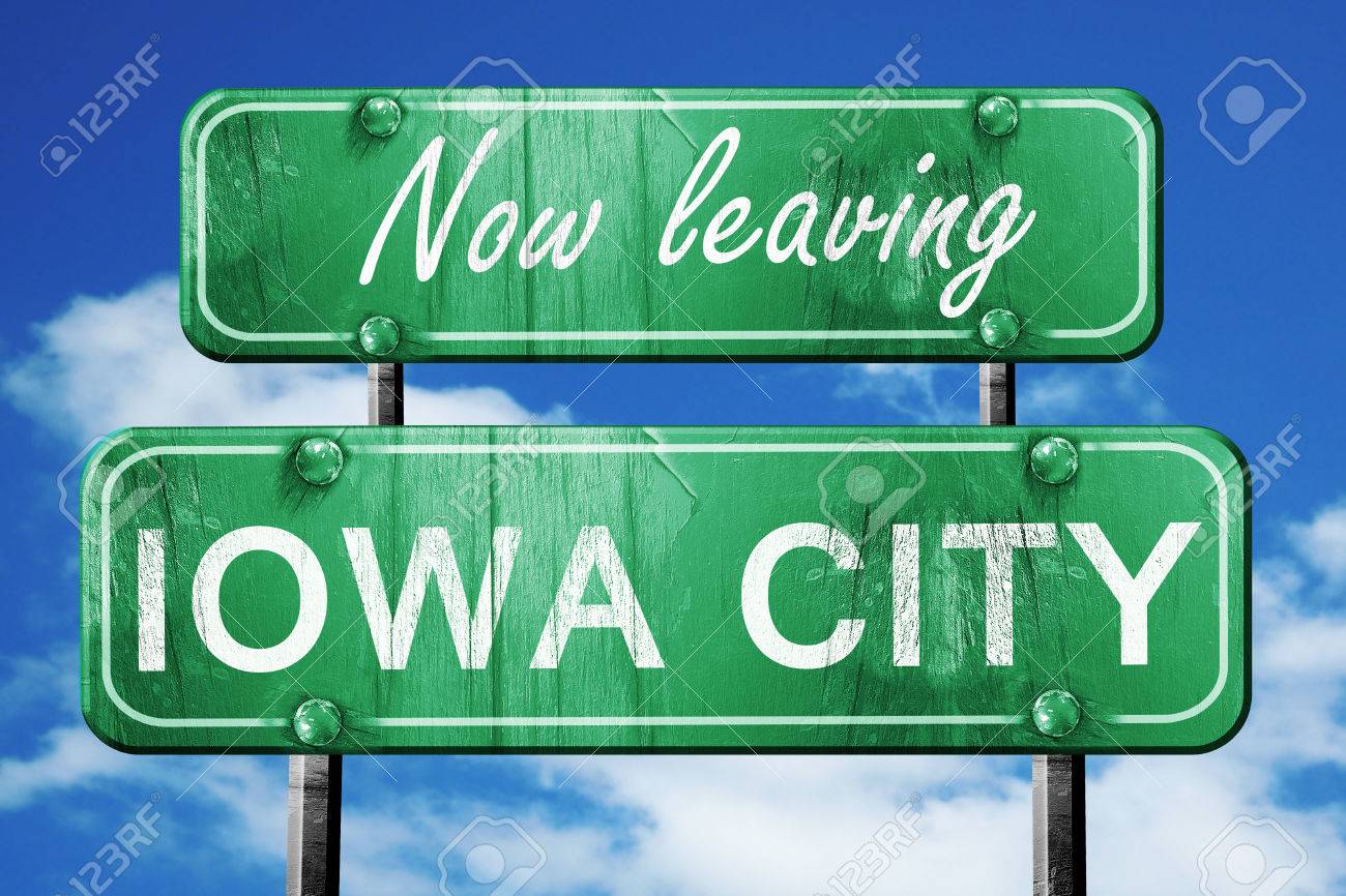55417299-now-leaving-iowa-city-road-sign-with-blue-sky.jpg