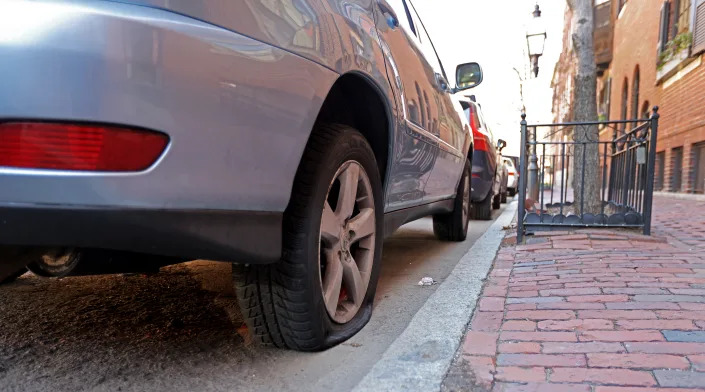 The deflated tires of SUVs in Boston.