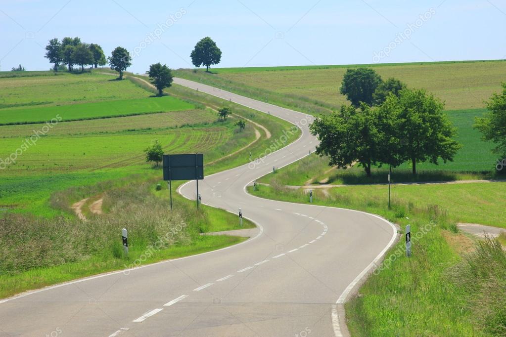 depositphotos_38570161-stock-photo-curvaceous-country-road.jpg