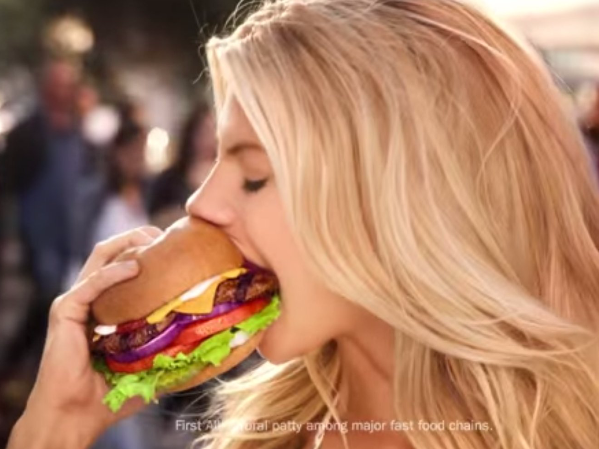 charlotte-mckinney-carls-jr-hamburger-model-eating-3.png