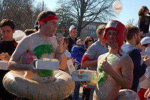 Students wearing donut costumes.