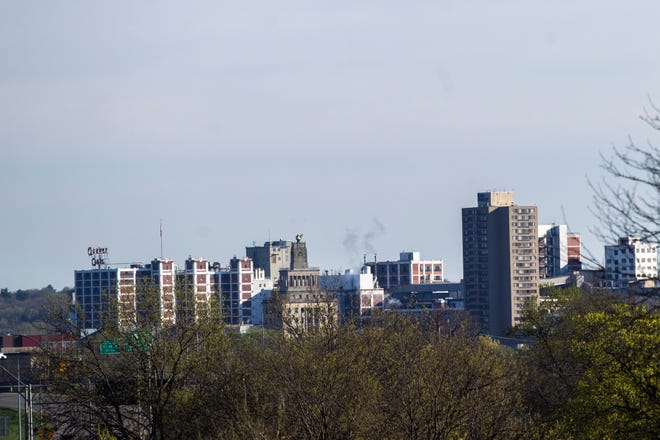 Buildings are pictured along the skyline from Interstate 380, Sunday, April 28, 2019, in Cedar Rapids, Iowa. Cedar Rapids is located in Linn County, the second-most populous county in Iowa.