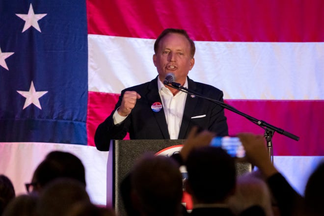 Incumbent Secretary of State Paul Pate speaks to the crowd during the Iowa GOP election night celebration on Tuesday, Nov. 8, 2022, at the Hilton Des Moines Downtown.